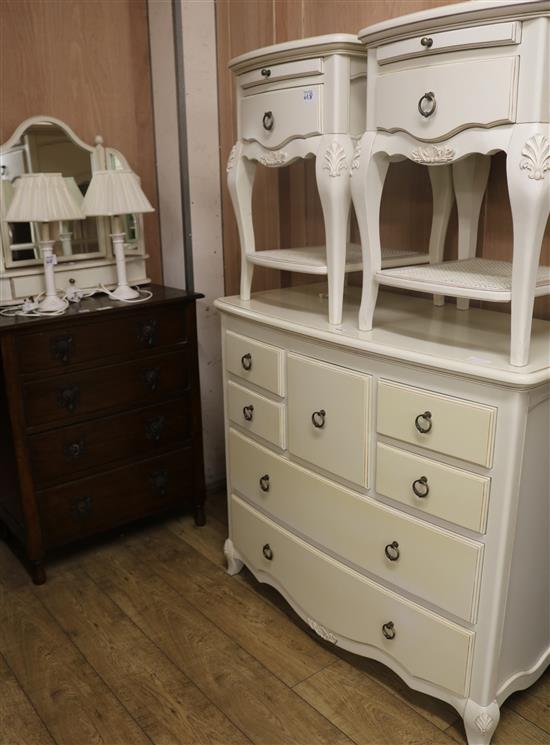 A white painted bowfronted dressing chest, a pair of bedside tables and a pair of lamps, W.110cm